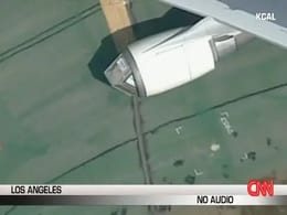 Baggage Cart Sucked into Engine