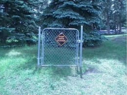 Stupid sign on a gate