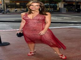 Lacey Chabert Strikes a Pose in Sexy Red Dress