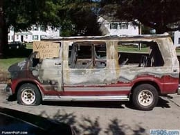 Completely Destroyed Van Listed for Sale in Driveway