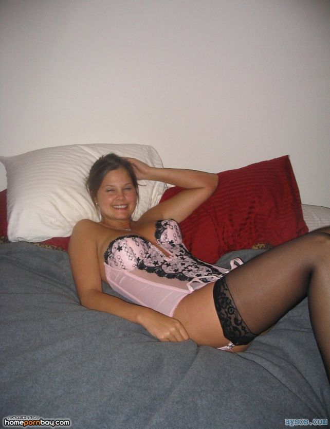 Cute Babe in Sexy Lingerie and Black Stockings Tempting