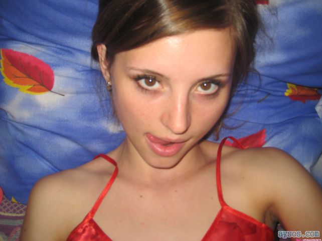 Cute brown eyed babe licking her lips