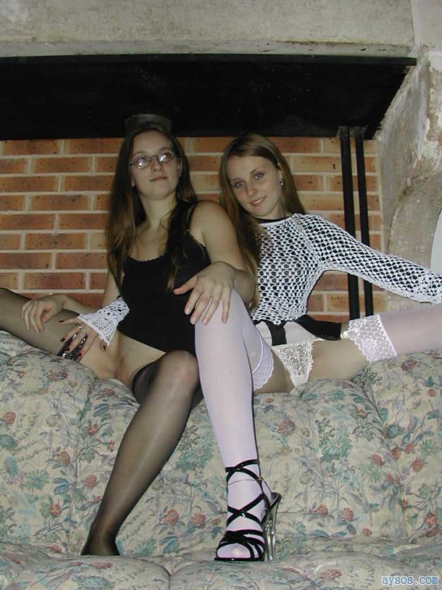 A couple of sluts showing their legs spread wide open