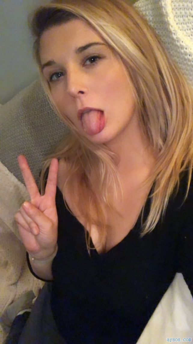 Sexy Blonde showing her tongue and Flashes Peace Sign