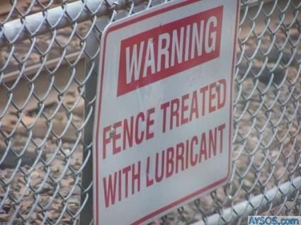 Fence Treated with Lubricant