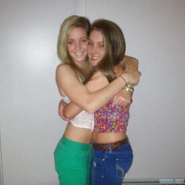 Two Cute Babes Pose Together in Colorful Outfits
