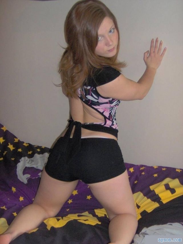 Cute Babe Wears a Short Outfit and strikes a Seductive Pose