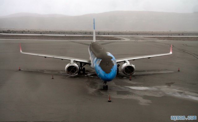 Chile volcano plane covered in ash