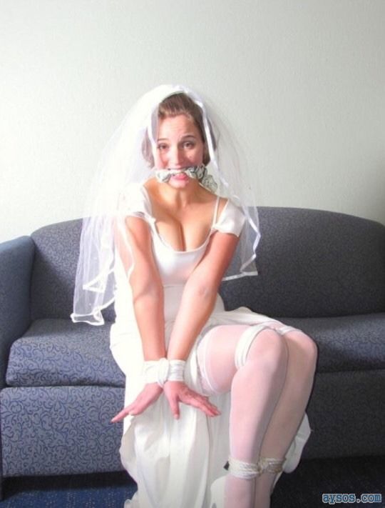 Newly married wife tied up in her wedding dress