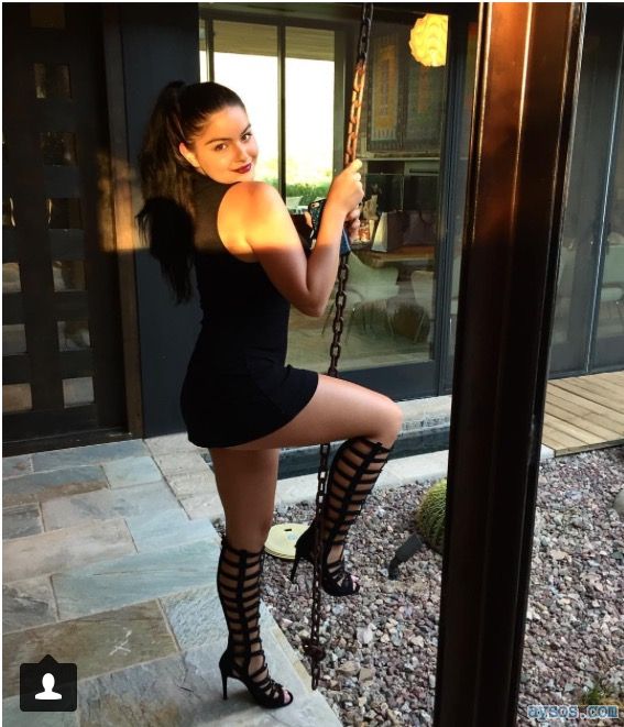 Ariel Winter looking very curvy in her sexy black dress and heels