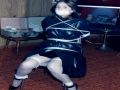 Hot girl tied up in stockings and heels scared of what is about to happen to her