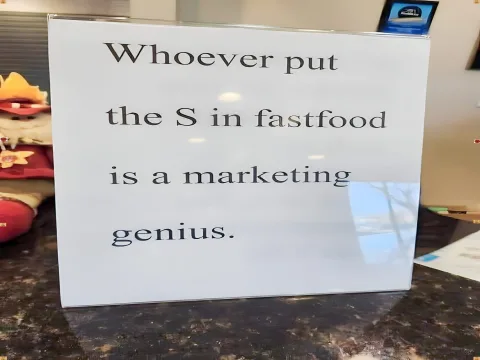 Sign Praises the Marketing Genius Behind Fast Food Typo