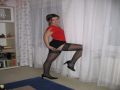 Gorgeous wife getting a little nasty for the camera wearing her silky black stockings with a short skirt and heels