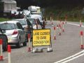 Lane closed stupid sign