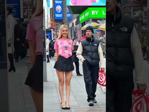 Aria Pink and Black Times Square Fashion Moment