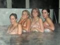 Ladies get caught naked in the hot tub