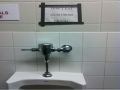 Funny sign dont eat the urinal gum