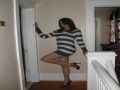Hot young wife with long legs showing off her heels