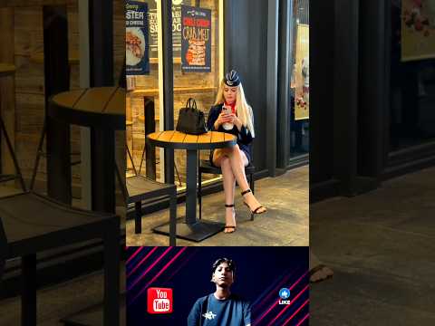 Air Hostess Waits Alone at Airport Café