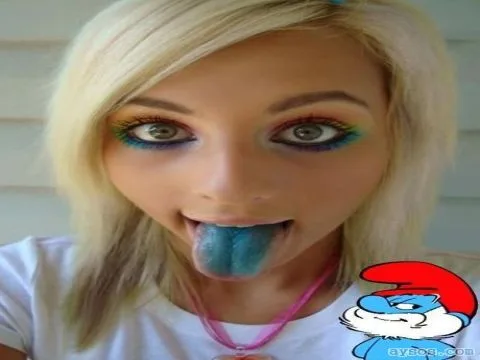 Cute babe eats Smurfs