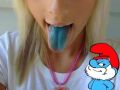 Cute babe eats Smurfs