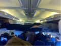 Person planking on passenger plane