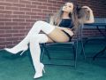 Ariana Grande white stockings and heels