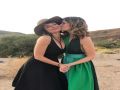 Milana Vayntrub gets kiss from another woman