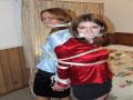 A couple of pretty ladies get all tied up and gagged ready for what is next
